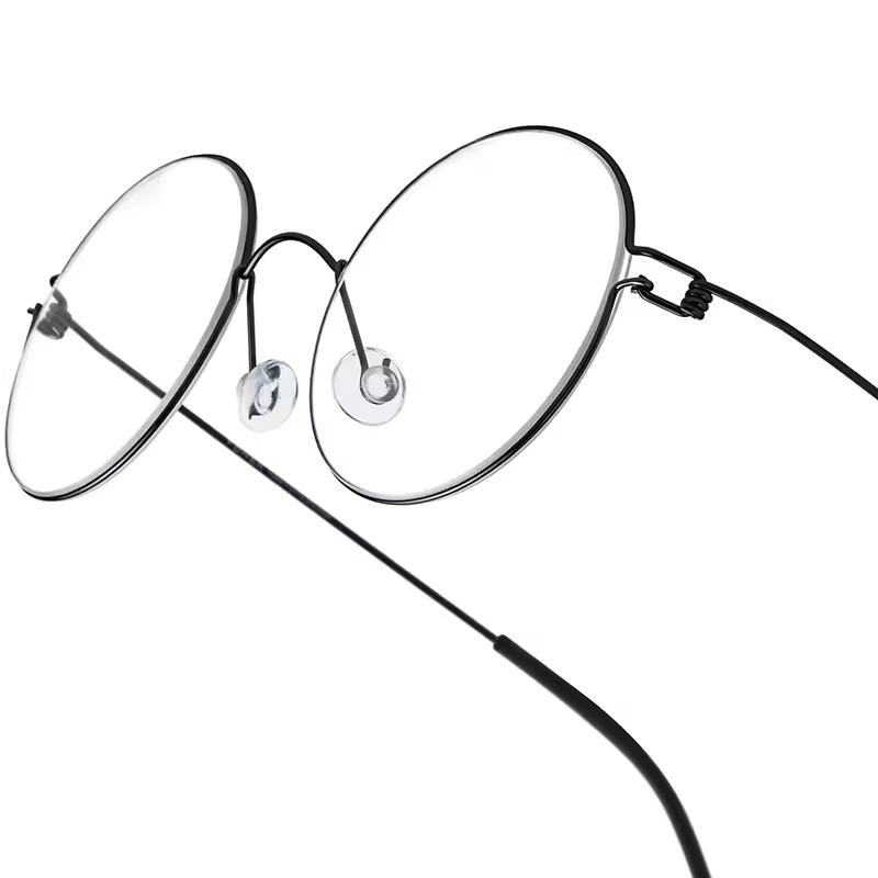 Lentes Fonex de aleacion de Titanio ligeras Unisex