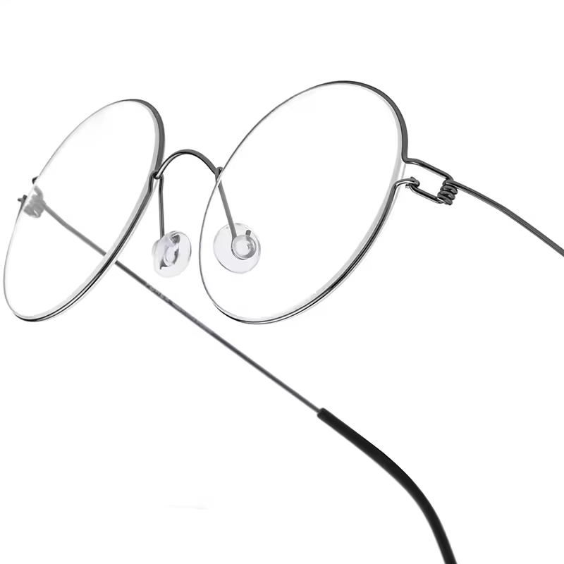 Lentes Fonex de aleacion de Titanio ligeras Unisex