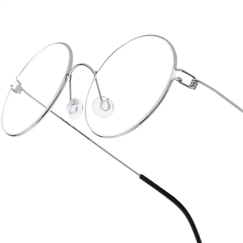 Lentes Fonex de aleacion de Titanio ligeras Unisex